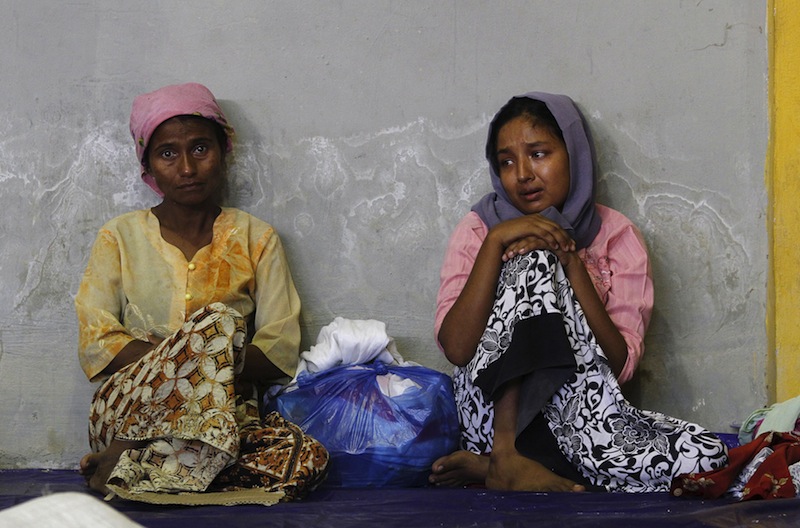 Migrants believed to be Rohingya rest inside a shelter after being rescued from boats, in Lhoksukon, Indonesia's Aceh Province May 11, 2015. u00e2u20acu201du00c2u00a0Reuters pic
