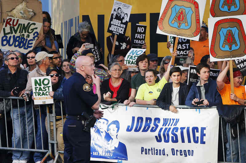 Protesters rally outside the hotel where Barack Obama is participating in a Democratic National Committee (DNC) event in Portland, Oregon May 7, 2015. u00e2u20acu201d Reuters pic