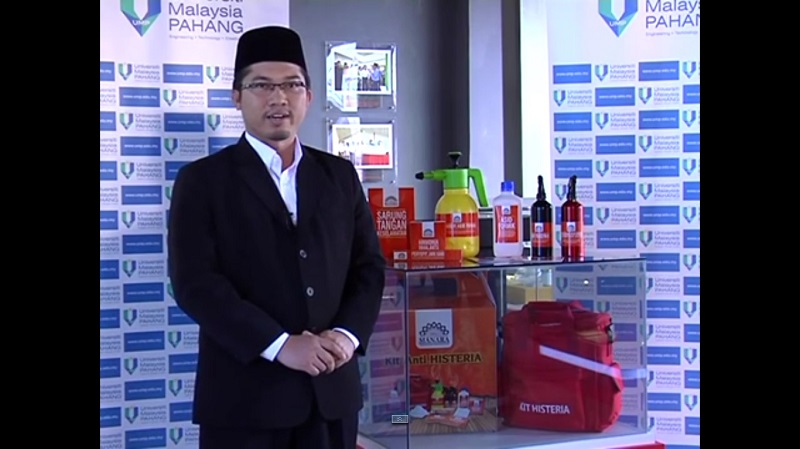 A screengrab from YouTube shows the public universityu00e2u20acu2122s Islamic centre and human development director Dr Mahayuddin with the anti-hysteria kit that comprises everyday items like chopsticks, salt, lime, vinegar, pepper spray, and formic acid.   