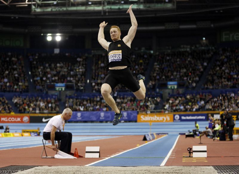 Olympic long jump champion Greg Rutherford at the long jump, Sainsburyu00e2u20acu2122s Indoor Grand Prix, Barclaycard Arena in Birmingham, central England, February 21, 2015. AFP PHOTO/IAN KINGTON