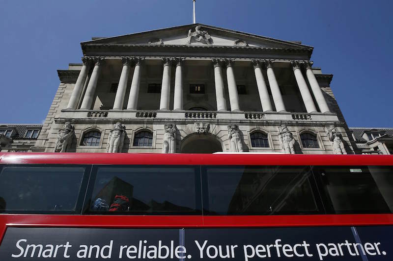 A bus passes the Bank of England in London May 13, 2015. u00e2u20acu201d Reuters pic