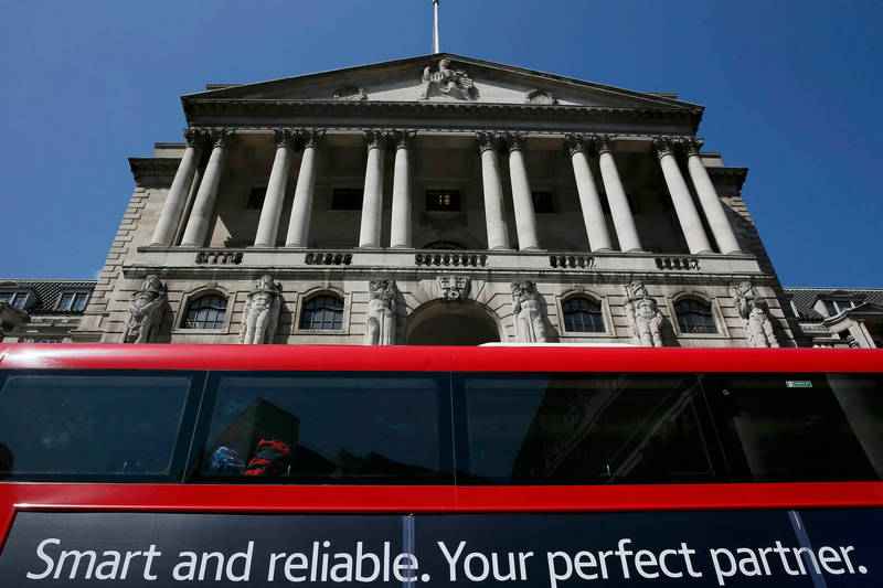 A bus passes the Bank of England in London, Britain May 13, 2015. The British private sector has shown encouraging growth in the last three months. u00e2u20acu201d Reuters pic