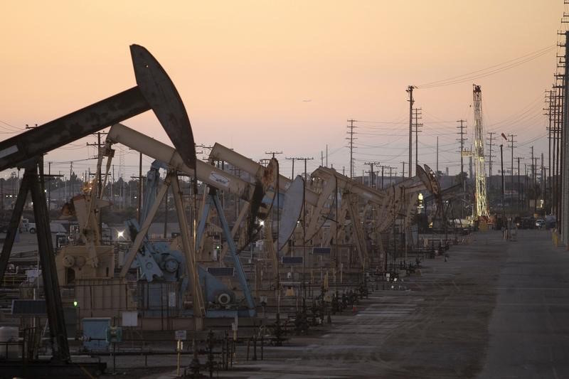 Oil rig pumpjacks, also known as thirsty birds, extract crude from the Wilmington Field oil deposits area near Long Beach, California July 30, 2013. u00e2u20acu201d Reuters pic