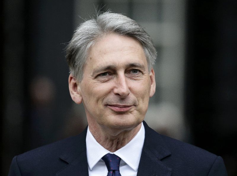 Philip Hammond leaves 10 Downing Street as Britainu00e2u20acu2122s Prime Minister David Cameron begins to appoint his cabinet after securing a majority goverment, in central London, May 8, 2015. REUTERS/Kevin Coombs