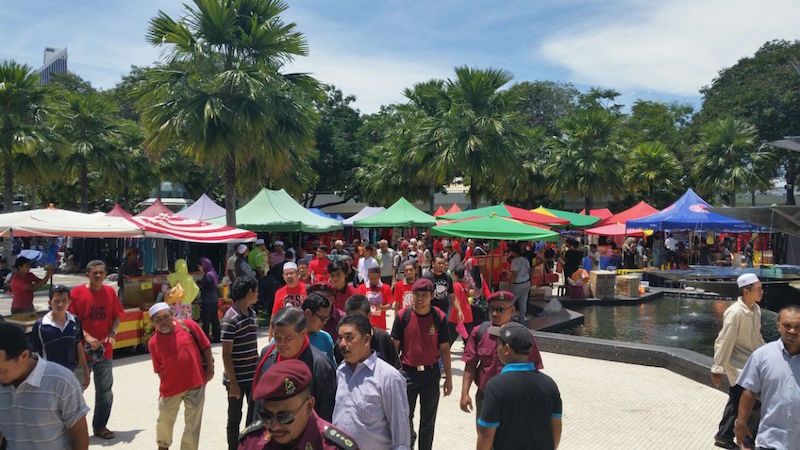 Hundreds gather early for anti-GST rally at Masjid Negara, one of the main starting points before marching to Dataran Merdeka, May 1, 2015. u00e2u20acu2022 Picture by Yap Tzu Ging