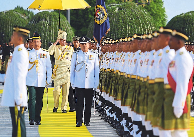 Sultan Nazrin Muizzuddin Shah saluting the guard-of-honour before his installation as the 35th Sultan of Perak at the Istana Iskandariah square here yesterday. u00e2u20acu2022 Picture by Marcus Pheong 