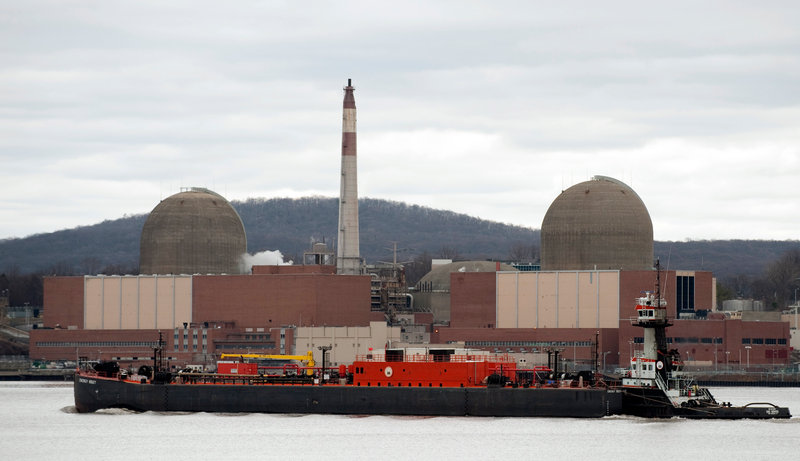 A barge passes by in front of Indian Point Nuclear Power Plant on the Hudson River March 22, 2011 in Buchanan, NY. u00e2u20acu201d AFP pic