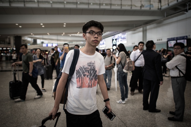 Hong Kong student activist Joshua Wong shows arrives at the international airport in Hong Kong on May 26, 2015. u00c2u00a0u00e2u20acu201d AFP pic