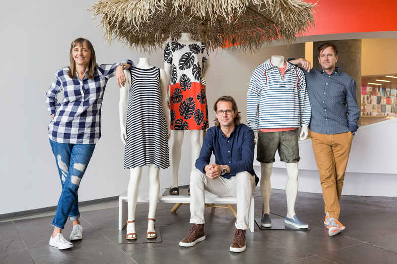 (From left) Jill Stanton, Stefan Larsson, and Ivan Wicksteed with a display in the lobby at the headquarters of Old Navy in San Francisco, May 14, 2015. u00e2u20acu201d Jason Henry/New York Times
