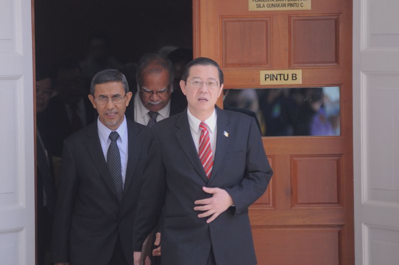 Lim Guan Eng says the two local councils will absorb the GST for services such as parking, hawker stall rental, halls rental, food court rental and other services. u00e2u20acu2022 Picture by K. E. Ooi