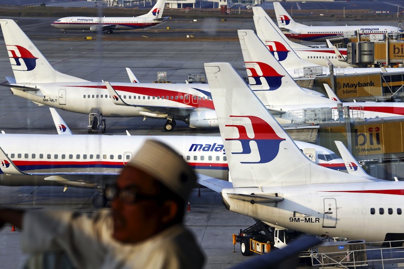 Malaysia Airlines planes are seen on the tarmac at the Kuala Lumpur International Airport in this March 12, 2014 file photo.u00c2u00a0u00e2u20acu201d Reuters pic