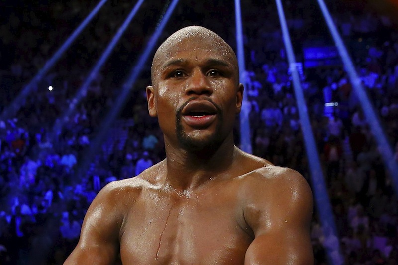 Floyd Mayweather Jr of the US celebrates after defeating Manny Pacquiao of the Philippines in their welterweight WBO, WBC and WBA (Super) title fight in Las Vegas, Nevada, May 2, 2015.u00c2u00a0u00e2u20acu201d Reuters pic