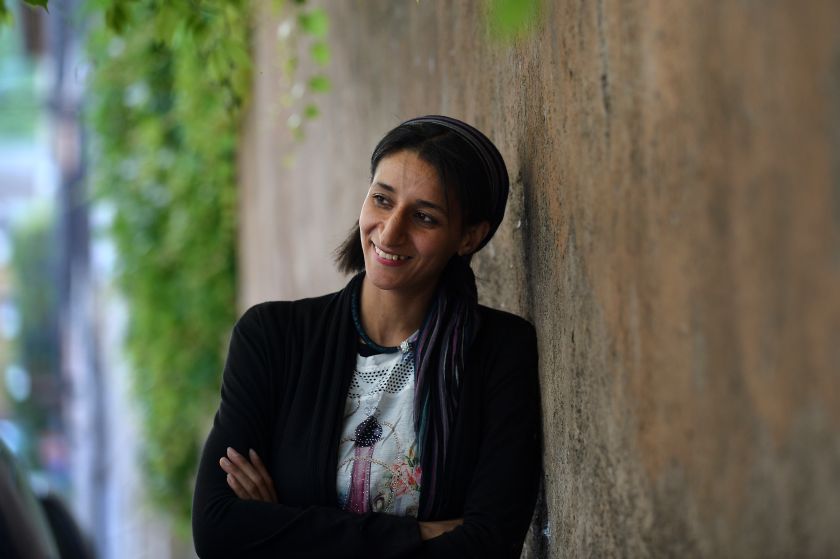 Human rights activist Nawal Soufi poses during a press conference for the release of the book u00e2u20acu02dcNawal, L'Angelo dei Profughiu00e2u20acu2122 (Nawal, The Angel of Refugees) by Italian journalist Daniele Biella on May 20, 2015 in Rome. u00e2u20acu201d AFP pic
