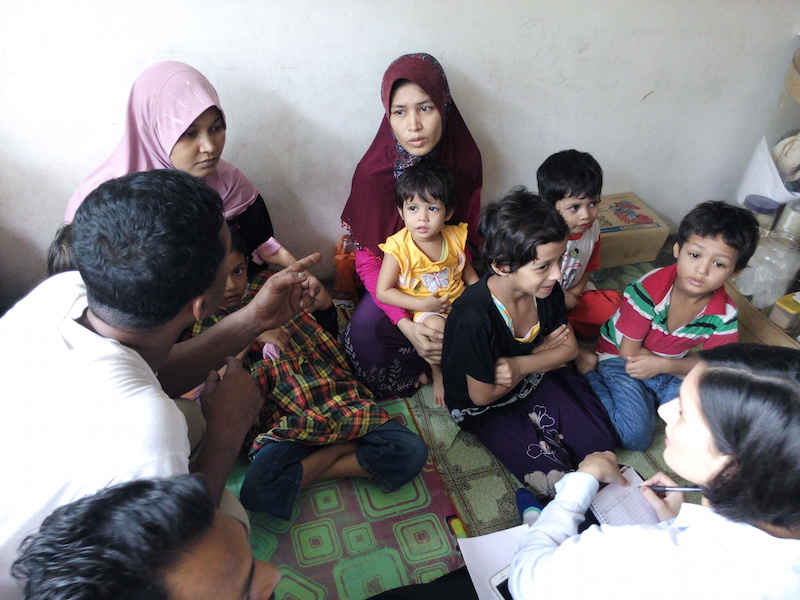 A Rohingya woman told the reporter her 11-year old son died as a result of lack of food and water when they were being held in a traffickers camp in Thailand.