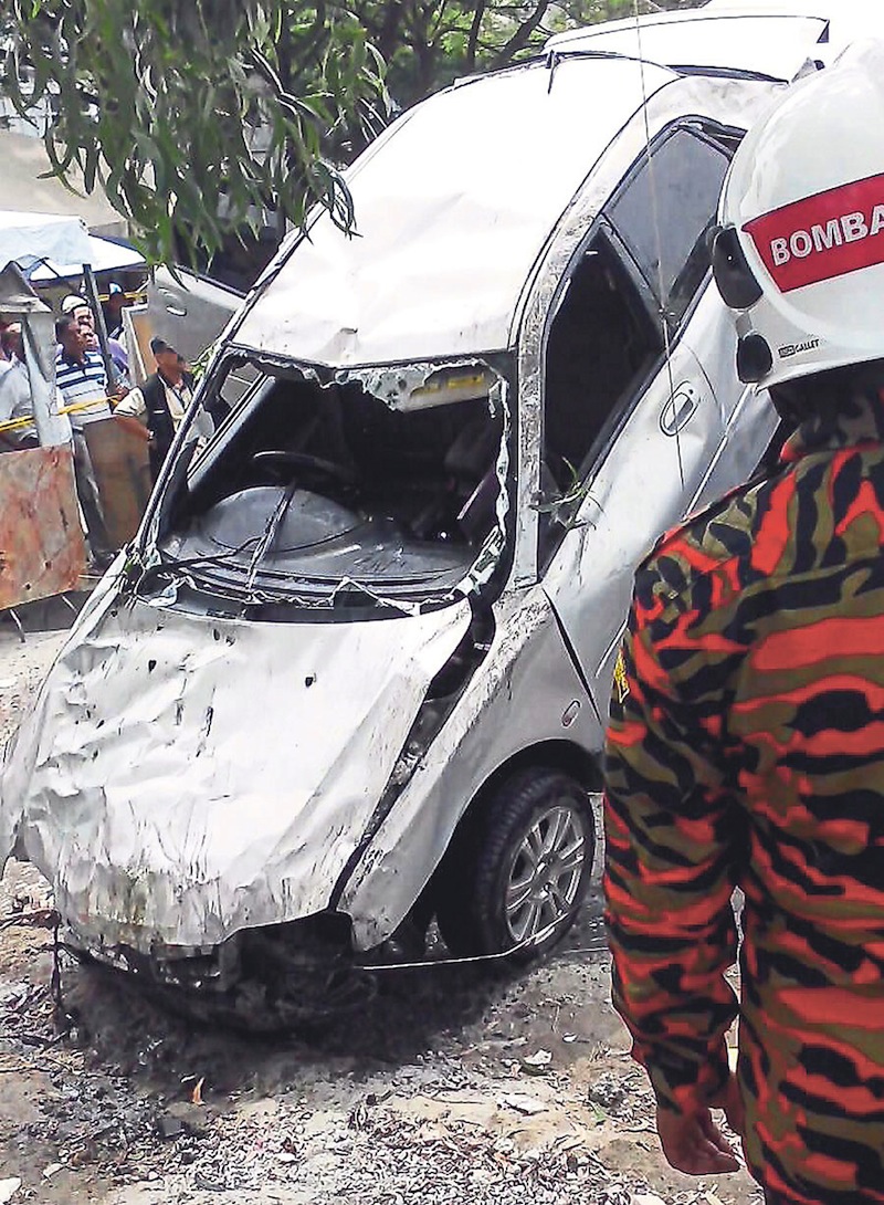 The car recovered from the pond with the body of Sivanathan inside. 