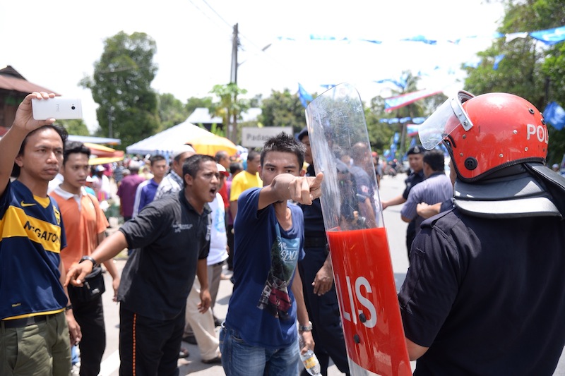 An angry supporter shouting back when clashes between two groups of supporters at SMK Guar Perahu, Guar Perahu in Permatang Pauh, Penang. May 7, 2015. u00e2u20acu201du00c2u00a0Picture by K.E. Ooi