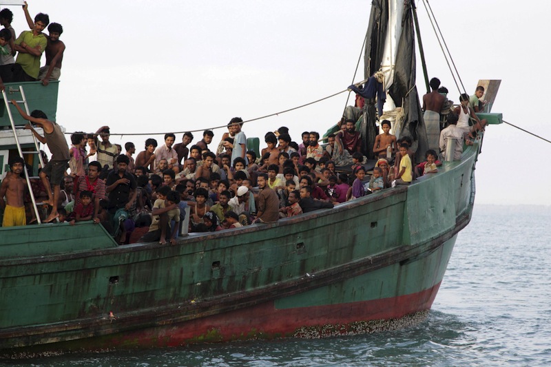 Rohingya and Bangleshi migrants wait on board a fishing boat before being transported to shore, off the coast of Julok, in Aceh province, May 20, 2015 in this photo taken by Antara Foto.u00c2u00a0u00e2u20acu201d Reuters pic