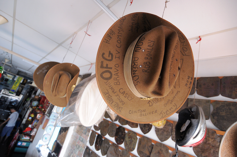RAAF hats hang from the ceiling at Hong Kong Bar. — Picture by KE Ooi