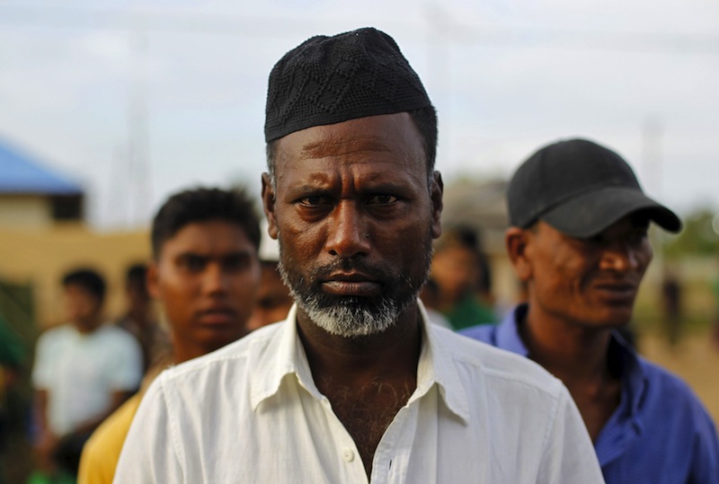 Rohingya migrants, who arrived in Indonesia by boat, wait in line for breakfast inside a temporary compound for refugees in Kuala Cangkoi village in Lhoksukon, Indonesia's Aceh Province May 17, 2015. u00e2u20acu201d Reuters pic