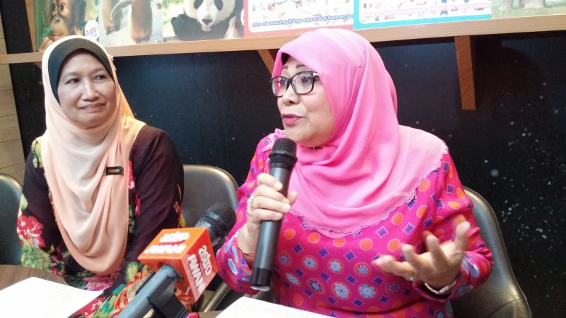 Women, Family and Community Development minister Datuk Rohani Abdul Karim (right) speaking at a press conference in Petaling Jaya on May 7, 2015. u00e2u20acu2022 Picture by Yiswaree Palansamy