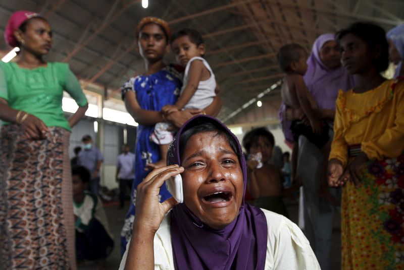 A Rohingya migrant who arrived in Indonesia by boat cries while speaking on a mobile phone with a relative in Malaysia, at a temporary shelter in Kuala Langsa in Indonesia's Aceh Province May 16, 2015. u00e2u20acu2022 Reuters pic