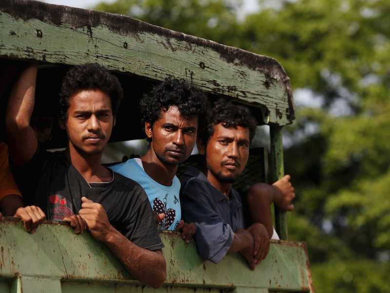 Rohinyga and Bangladeshi refugees are transported to a navy boat where they will be taken to mainland Malaysia, after they landed at Pantai Pasir Berdengung beach in Langkawi May 14, 2015. u00e2u20acu201d Reuters pic