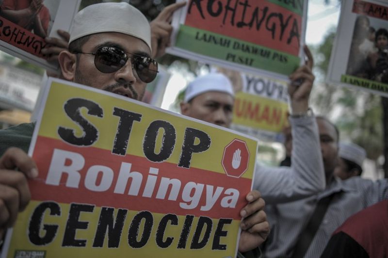 Malaysian NGO members hold placards during a protest outside the Myanmar embassy in Kuala Lumpur on May 21, 2015. u00e2u20acu2022 AFP pic