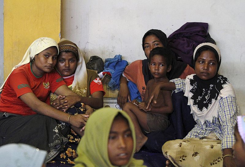Migrants believed to be Rohingya rest inside a shelter after being rescued from boats, in Lhoksukon, Indonesia's Aceh Province May 11, 2015. u00e2u20acu201d Reuters pic