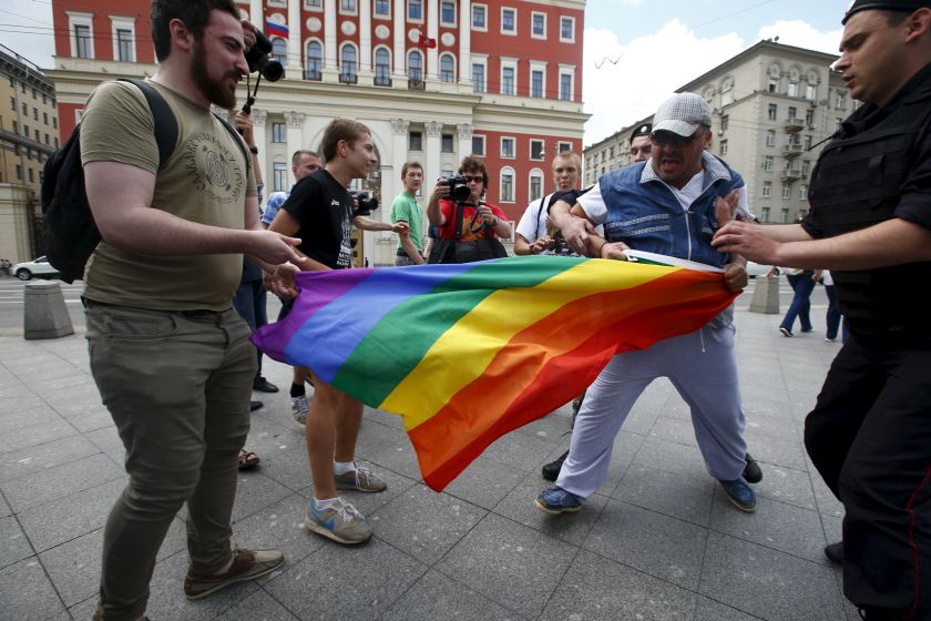 Anti-gay protesters try to tear a rainbow flag during an LGBT (lesbian, gay, bisexual, and transgender) community rally in central Moscow, Russia, May 30, 2015. u00e2u20acu2022 Reuters pic