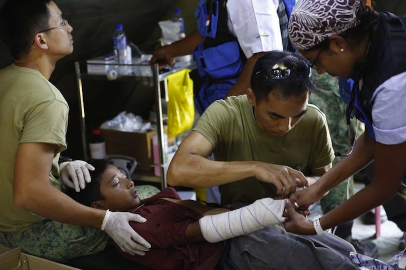 The SAF medical team working with the staff from The Ministry of Health. u00e2u20acu201du00c2u00a0TODAY pic