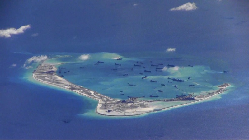 Chinese dredging vessels are purportedly seen in the waters around Mischief Reef in the disputed Spratly Islands in the South China Sea on May 21, 2015. u00e2u20acu201du00c2u00a0Reuters pic