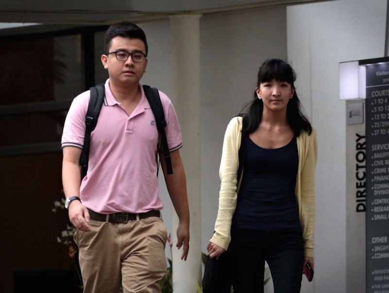 The duo behind u00e2u20acu02dcThe Real Singaporeu00e2u20acu2122, Yang Kaiheng (left) and Ai Takagi, arrive at court in Singapore May 4, 2015. u00e2u20acu201d TODAY pic