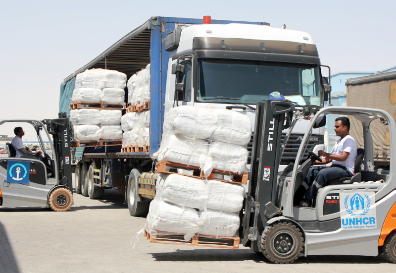 A UNHCR employee arranges aid at Dubai International Humanitarian city in Dubai, United Arab Emirates, before shipping them to Yemen May 14, 2015. u00e2u20acu201d Reuters pic
