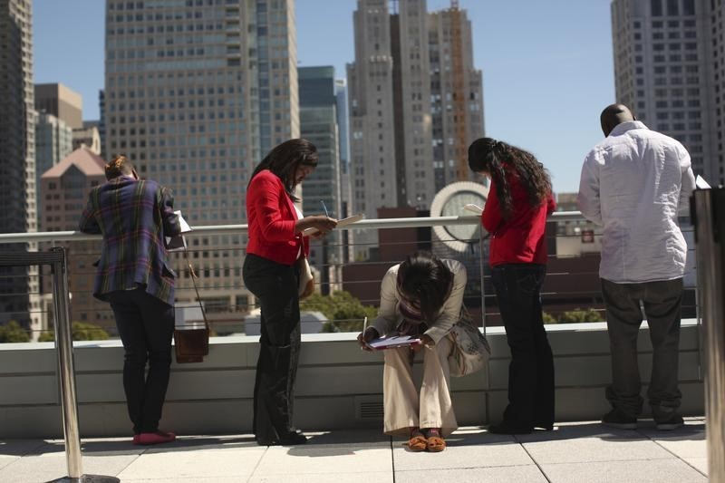 Job seekers apply for the 300 available positions at a new Target retail store in San Francisco, California August 9, 2012. Despite uneven econonomic growth, the US job market tightens. u00e2u20acu201d Reuters pic