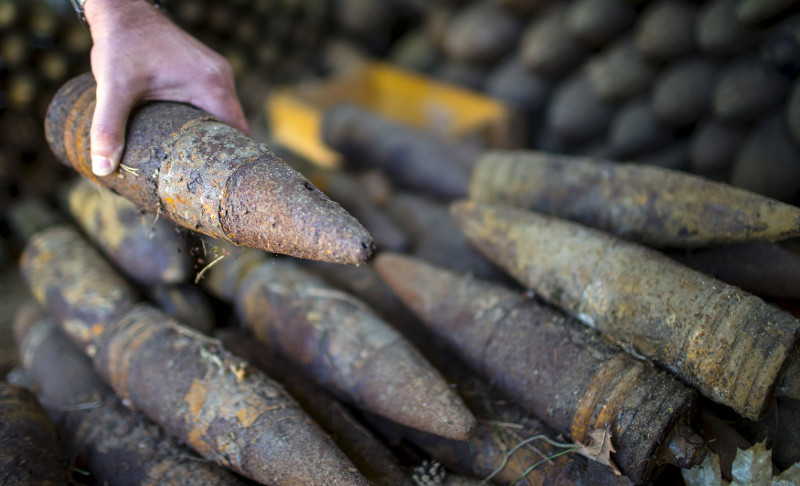 A police munitions expert piles recovered artillery shells at a police blasting ground in Berlin's Grunewald forest, Germany, April 29, 2015. u00e2u20acu201d Reuters pic