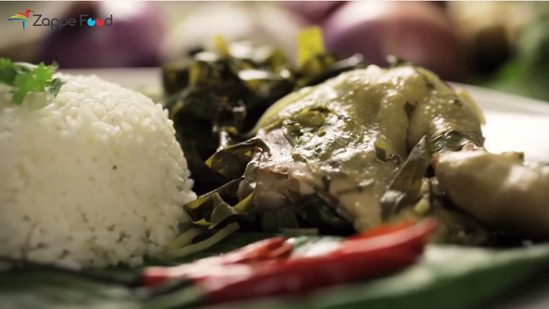 Screen capture of the video by Zappe Food showing 'ayam pansuh' served with white rice.