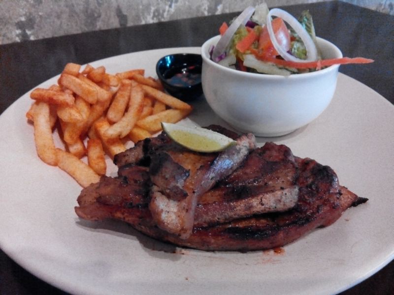 A sampling of Jacknife Bar & Grill's signature Kadazan-style pork chops.