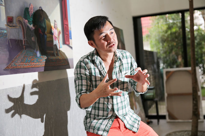 Leon Leong takes photos of his subjects before he paints them and alters them to his own liking. — Picture by Choo Choy May