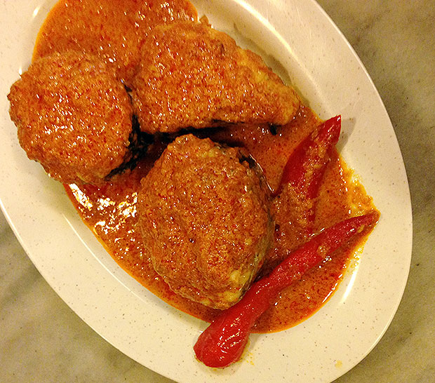 Ikan masak putih has a reddish appearance due to the addition of red chilli paste.