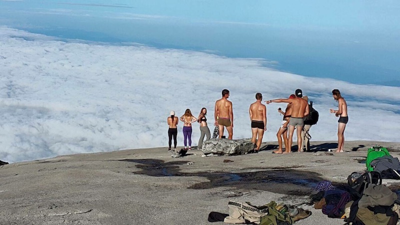 The images being posted on Facebook and spread through Whatsapp show a group of Caucasian-looking adults in various states of undress.