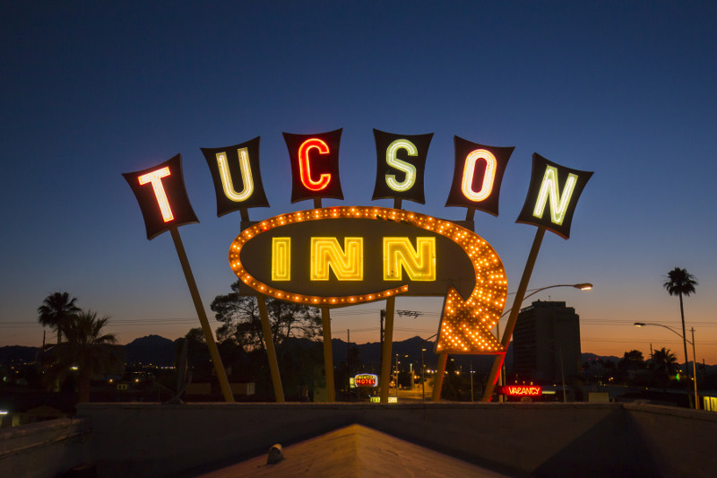 A neon sign lights up the Miracle Mile in Tucson.