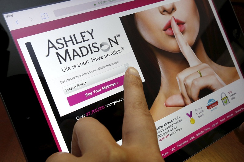 The homepage of the Ashley Madison website is displayed on an iPad, in this photo illustration taken in Ottawa, Canada July 21, 2015. u00e2u20acu201d Reuters pic
