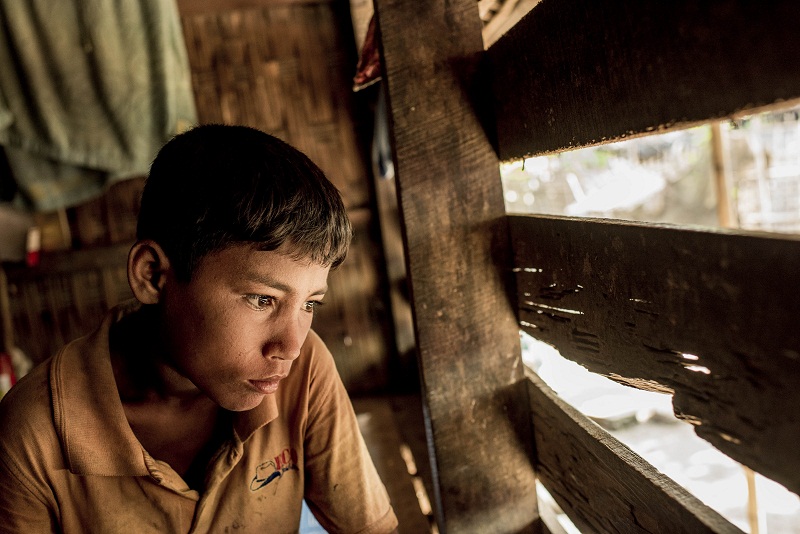 Jubair, 13, who was left behind when his mother and siblings fled Myanmar for Malaysia, in the Rohingya village of Thayet Oak, Myanmar, June 2, 2015.  — Picture by Tomas Munita for The New York Times
