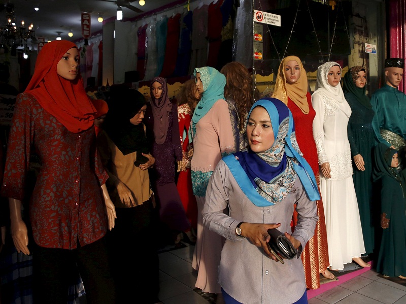 Women shop at the Ramadan bazaar ahead of the Hari Raya Aidilfitri celebrations in Kuala Lumpur, July 14, 2015. u00e2u20acu201d Reuters pic