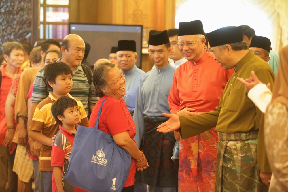 Prime Minister Datuk Seri Najib Razak greets guest at a Raya Open house at Seri Perdana, Putrajaya, on July 17, 2015. u00e2u20acu201d Picture by Choo Choy May