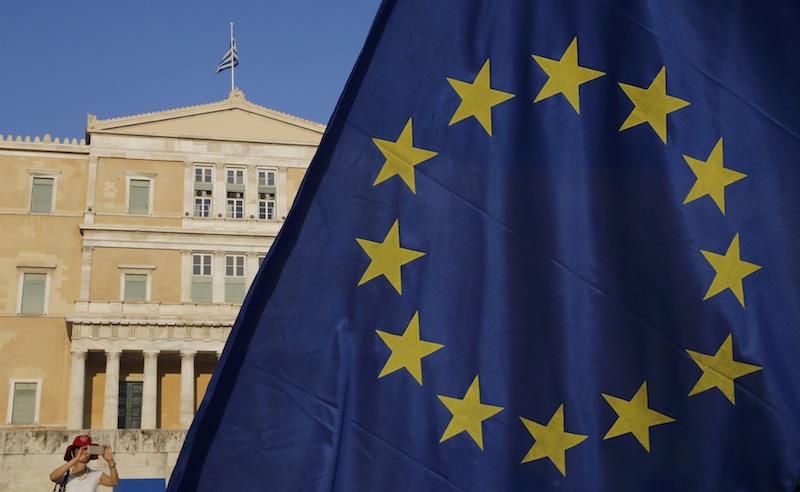 The European Union flag is seen in front of the parliament building during a Pro-Euro rally in Athens, Greece, July 9, 2015. u00e2u20acu201d Reuters pic