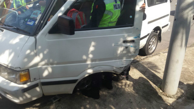 A bungling drug user runs into a RTD roadblock during a police car chase. u00e2u20acu201d Picture by Julia Chan