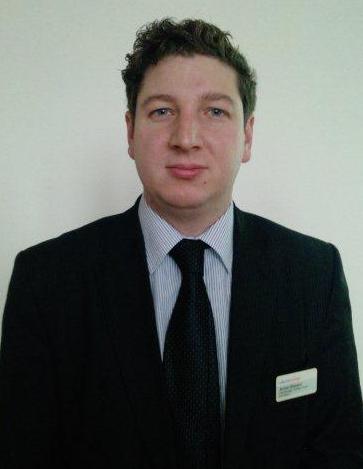 A headshot of James Steward from RailFutures.