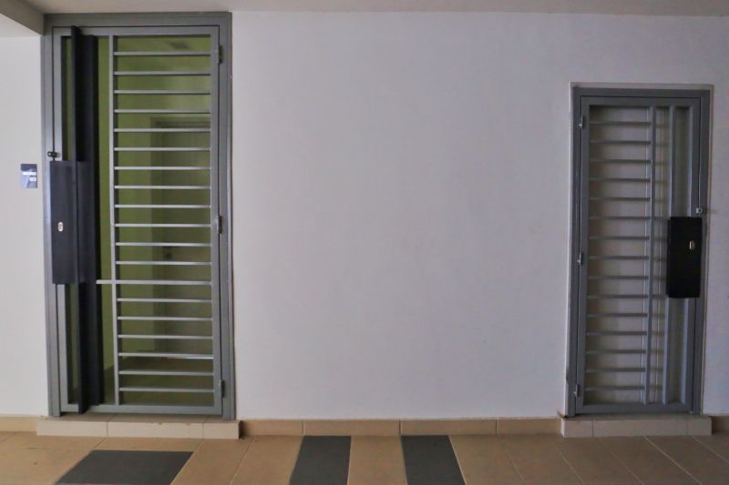 The dual entrances of a dual-key condominium unit. ― Picture by Saw Siow Feng