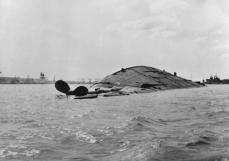 USS Oklahoma capsizes in a photo taken during the attack on Pearl Harbor. u00e2u20acu201d File pic